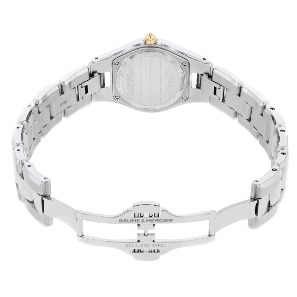 An image of a pre-owned wristwatch showing the back view with an open clasp. The watch features a silver stainless steel band with a visible brand name engraved on the clasp. The focus is on the watch's back case and the open clasp, captured from a slightly elevated angle at a close distance.