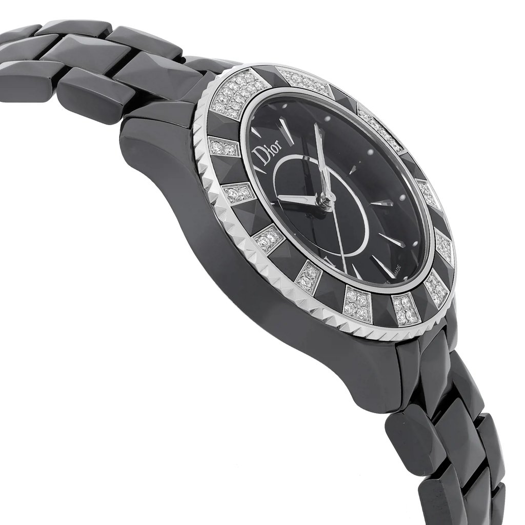 An image of a wristwatch captured from a side profile view, showing the opposite side of the crown. The watch features a sleek black bracelet and a distinctive bezel adorned with alternating black and diamond-like segments. The face of the watch is dark, with a minimalistic design, set at an angle that highlights its elegant contours. The photograph is taken at a close distance, emphasizing the intricate details of the watch's design.
