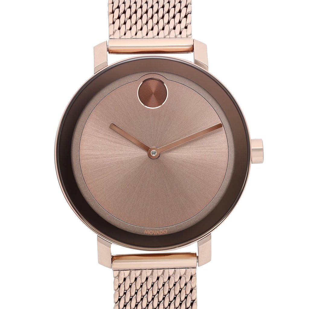 An image of a wristwatch displaying a front close-up shot of the watch face. The watch has a minimalist design with a rose gold tone and a simple dial, featuring two hands without hour markers. It is attached to a matching mesh band. The condition is noted as "new with defects."