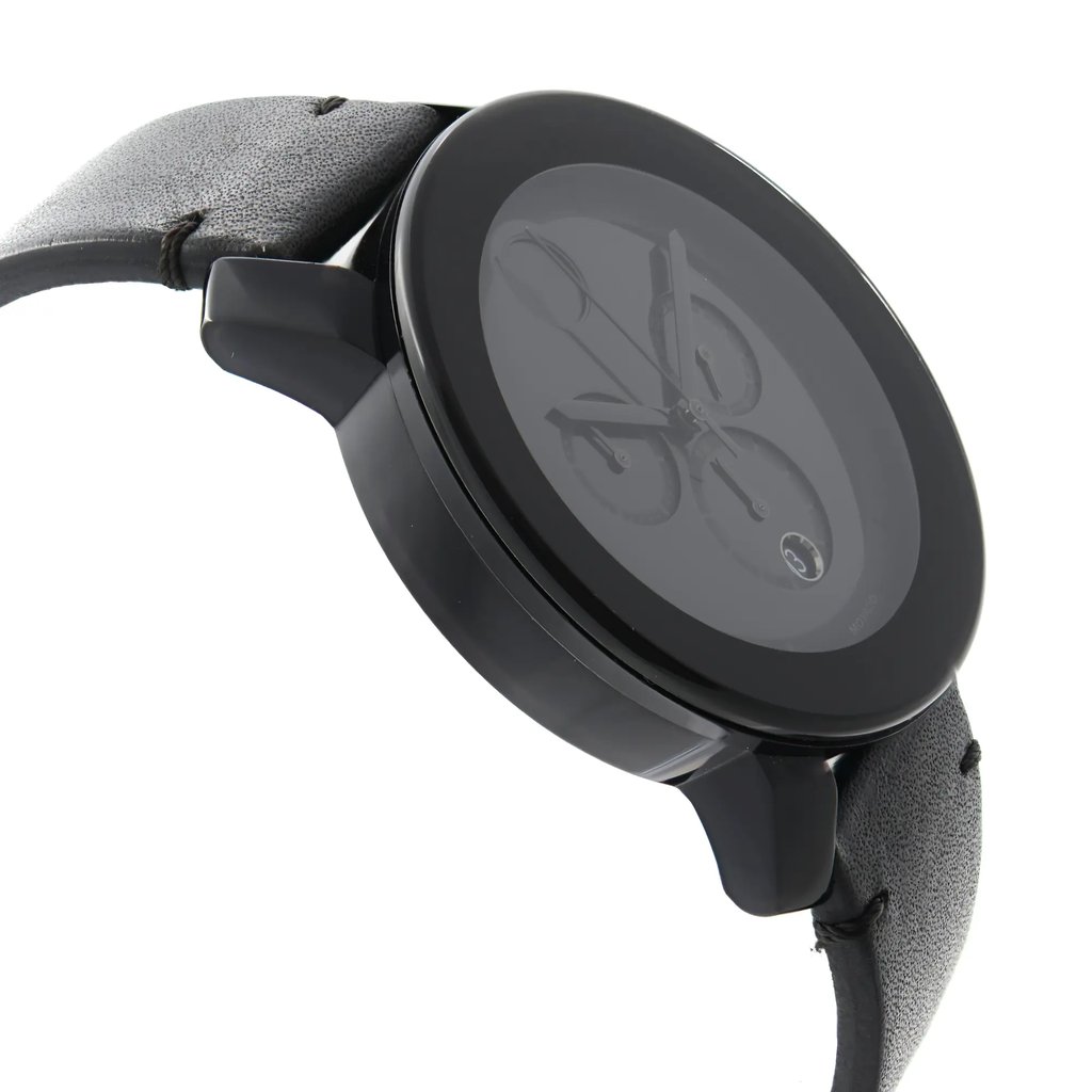 An image of a pre-owned wristwatch viewed from the side profile, opposite the crown. The watch is positioned at an angle, showcasing its sleek, round case and dark, textured leather strap. The distance is close enough to highlight the watch's minimalist design and detailed face with subdials.