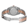 An image of a men's Rolex wristwatch in a display model condition, positioned centrally with a back view and an open clasp. The watch features a round stainless steel case with a screwback, and a band that combines stainless steel with rose gold elements. The closure is a fold-over clasp, visible and partially extended in the middle of the frame. The watch is captured from a direct rear angle at a close distance, highlighting the craftsmanship and materials of the band and caseback.