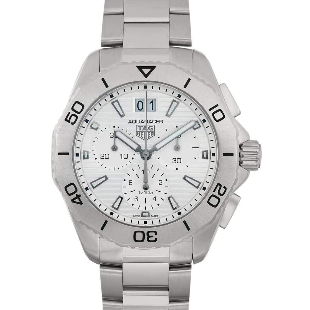 An image of a front close-up shot of a TAG Heuer Aquaracer men's wristwatch. The watch is shown at a straight-on angle with the dial facing directly towards the viewer, providing a clear view of the features. It has a silver dial, gray bezel, and stainless steel band and case, all in excellent, unworn condition. The round watch face displays stick indexes, a date indicator at the 12 o'clock position, a small seconds subdial, and chronograph features. The watch is positioned centrally in the frame with a slight distance allowing the entire watch face and part of the band to be visible.