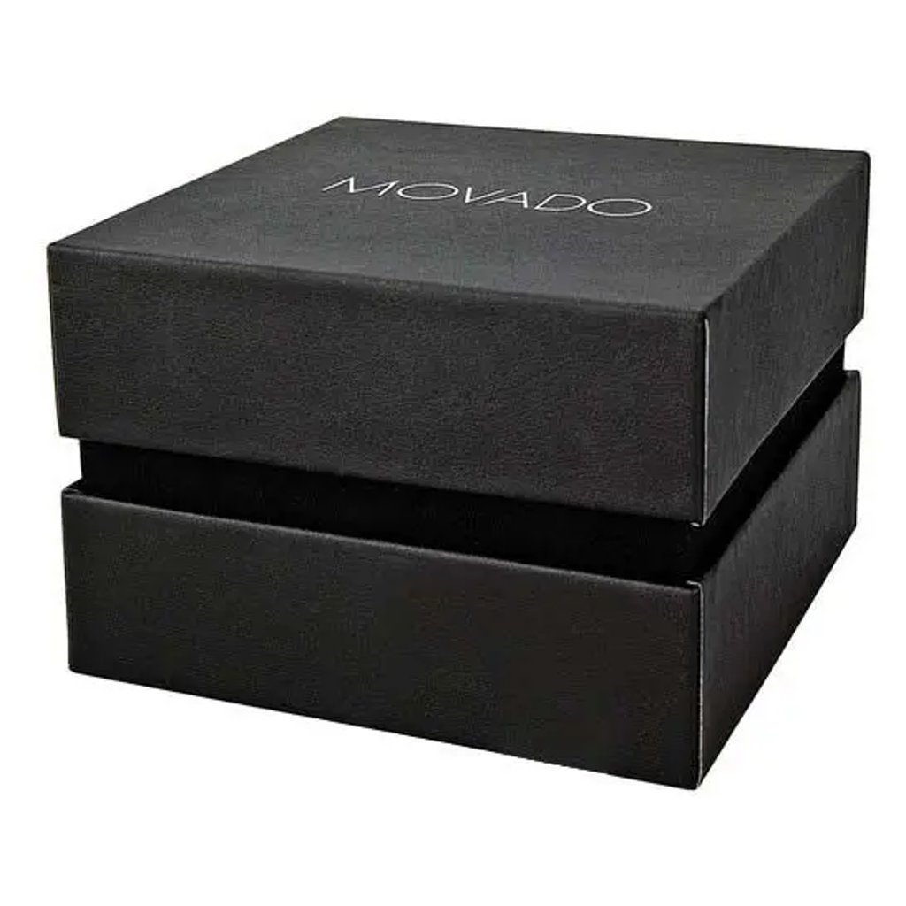 An image of a black wristwatch box with the brand name "Movado" on the lid, shown from a slightly elevated angle. The box is fully closed, and the image is captured from a close distance, highlighting its sleek design and textured surface.