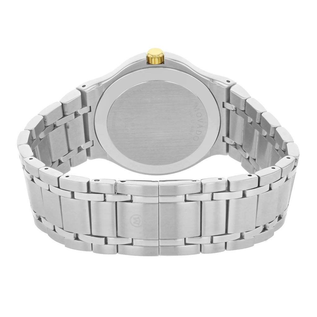 An image of a pre-owned wristwatch showcasing the back view with a focus on the closed clasp. The watch features a stainless steel band and a circular case with a gold-colored winding crown. The angle is straight on and the image is taken from a close distance, highlighting the details of the bracelet links and the back case.