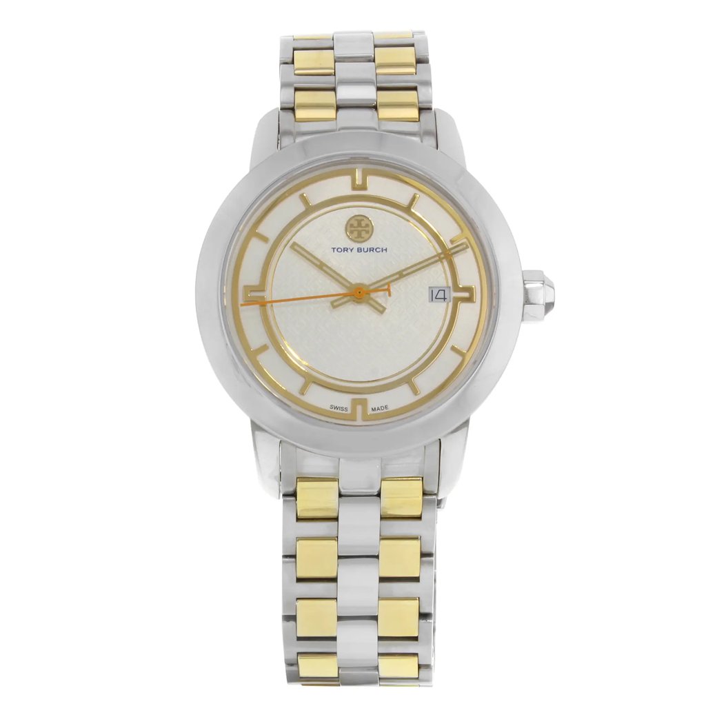 An image of a Wristwatch by Tory Burch. This Pre Owned item is designed for Women, featuring a Casual style. It has a Quartz movement and an Analog display with a Cream dial color. The indices include Sticks. The band is made of Stainless and Solid Gold and the case is made of Stainless Steel. The watch has a Round shape with a case size of 37 mm and a case thickness of 9 mm.