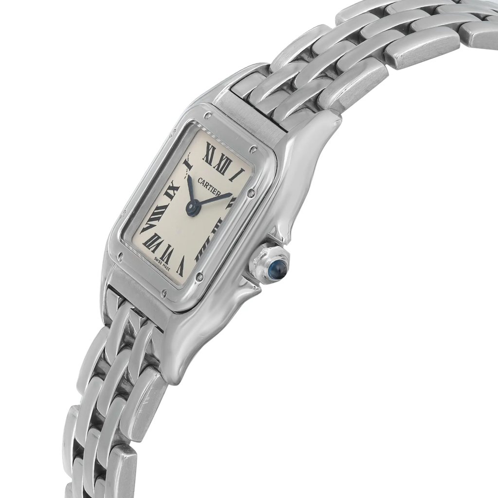 An image of a pre-owned Cartier wristwatch designed for women, presented in a side profile view with the crown visible. The watch features a square stainless steel case connected to a stainless steel band, with steel bezel. Roman numerals are displayed on the silver dial, and there is a blue cabochon set into the crown. Light signs of wear can be seen on the surface, indicating casual style usage. The watch is shown in close-up, capturing the details with clarity from a slight angle to emphasize the crown and the shape of the case.