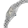 An image of a pre-owned Cartier wristwatch designed for women, presented in a side profile view with the crown visible. The watch features a square stainless steel case connected to a stainless steel band, with steel bezel. Roman numerals are displayed on the silver dial, and there is a blue cabochon set into the crown. Light signs of wear can be seen on the surface, indicating casual style usage. The watch is shown in close-up, capturing the details with clarity from a slight angle to emphasize the crown and the shape of the case.