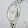 An image of a Wristwatch by Victorinox. This Pre Owned item is designed for Women, featuring a Casual style. It has a Quartz movement and an Analog display with a Silver dial color. The indices include 12-Hour Dial,Arrow Markers. The band is made of Stainless Steel and the case is made of Stainless Steel. The watch has a Round shape with a case size of 35 mm and a case thickness of 8 mm.