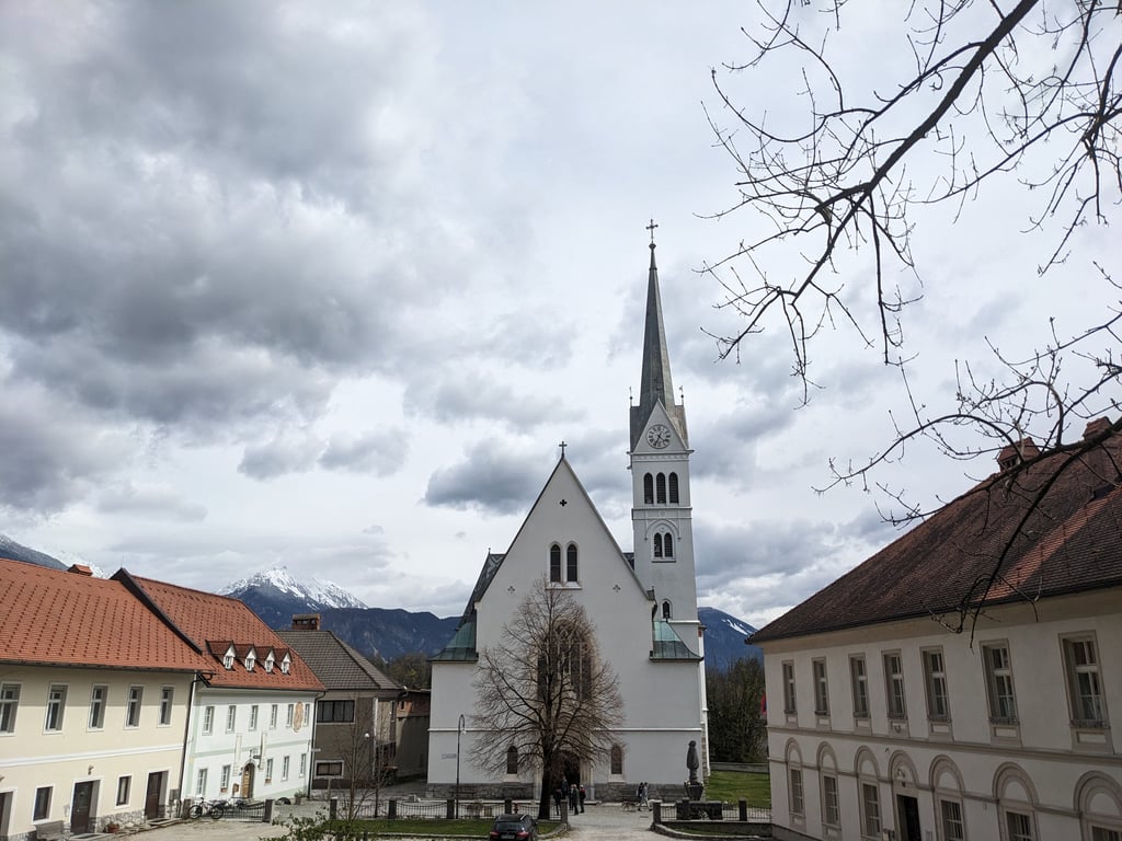 St. Martin's Parish Church with the Alps in the background