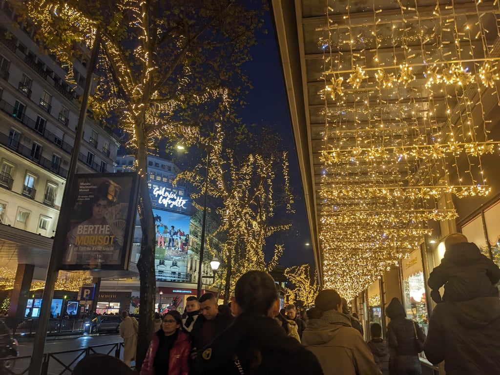 Paris streets glowing with festive lights