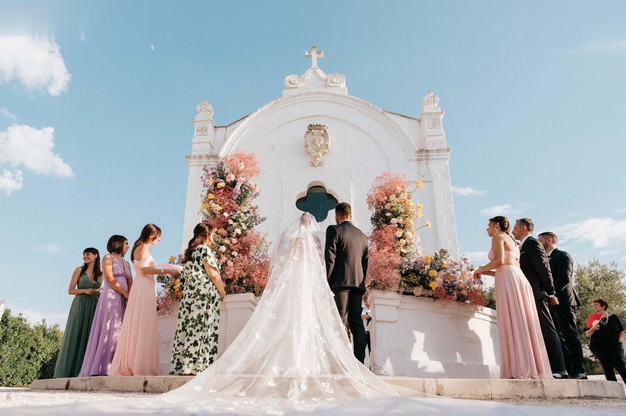 A wedding ceremony at a white chapel in Puglia, in black and white