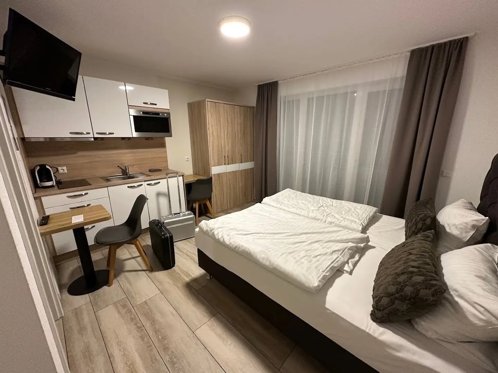 GLEUEL INN - digital hotel & serviced apartments & boardinghouse mit voll ausgestatteten Küchen