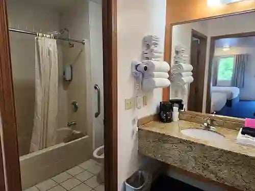 Guest bathroom with a granite vanity and fresh towels