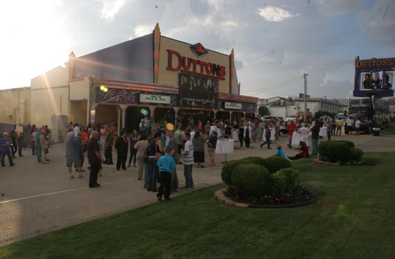 A crowd gathered outside the Dutton Family Theater at dusk