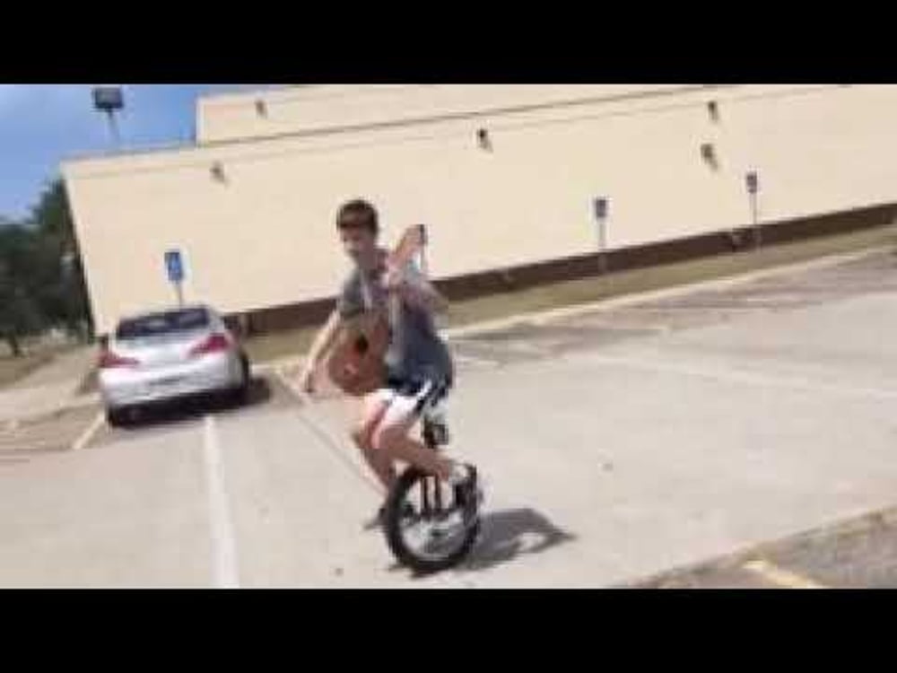 (WORLD RECORD) Guitar on Unicycle - longest time ever