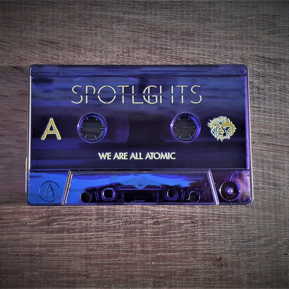 US ORDERS:  SPOTLIGHTS - We Are All Atomic Limited Edition Cassette (Flourescent Purple)