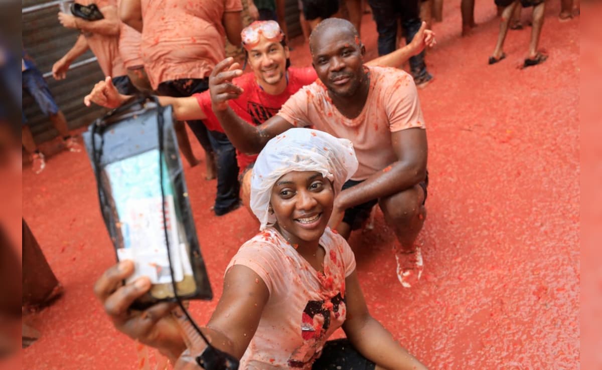 Participants pose for a photo as they enjoy the traditional festival.