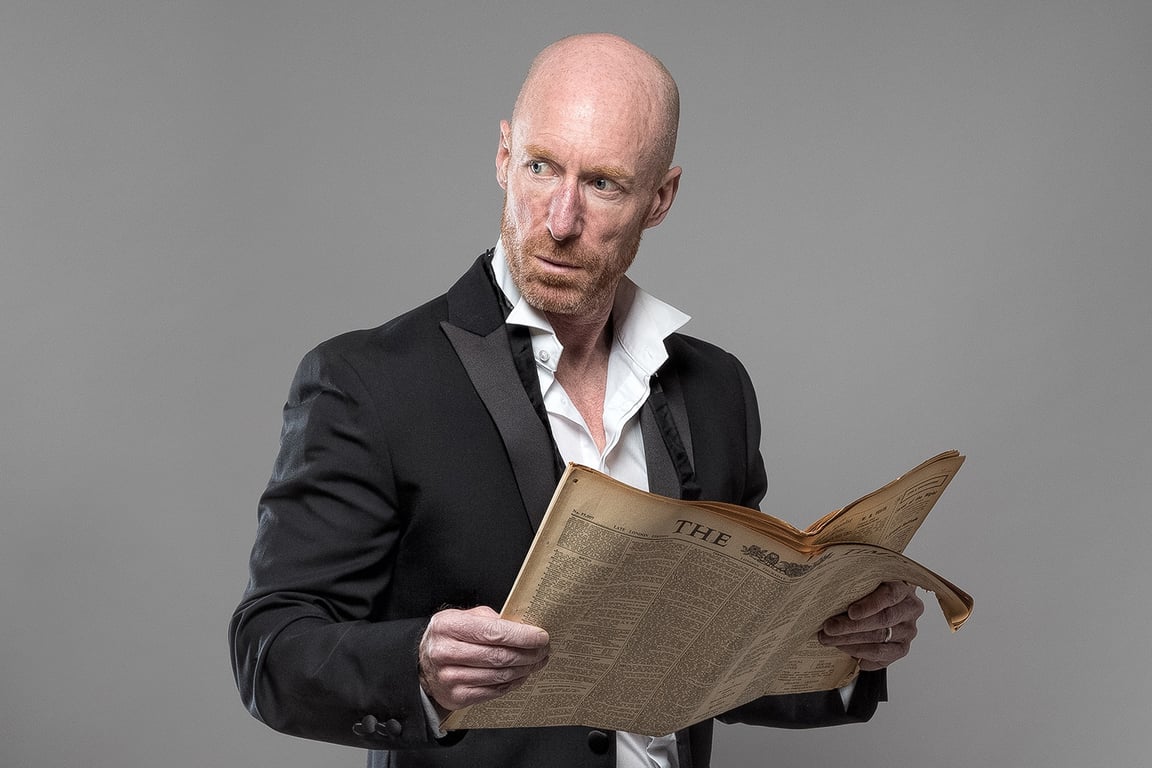 Удивленный мужчина, газета, экономика, кризис. Фото pixabay.com