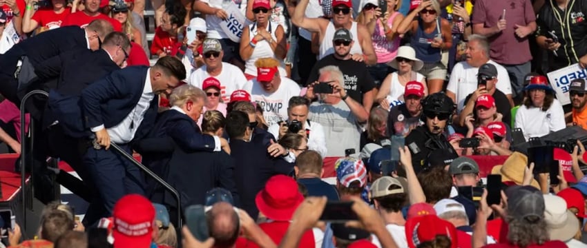 Свидетель митинга Трампа рассказывает, как был застрелен мужчина рядом с ним.