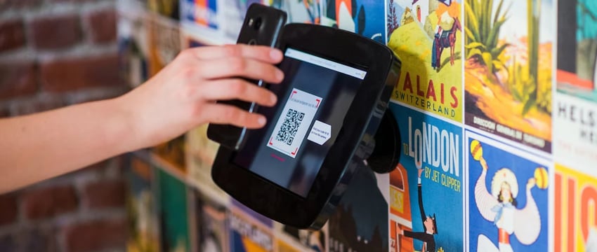 QR-код в Париже вызывает опасения о цифровой изоляции перед Олимпийскими играми