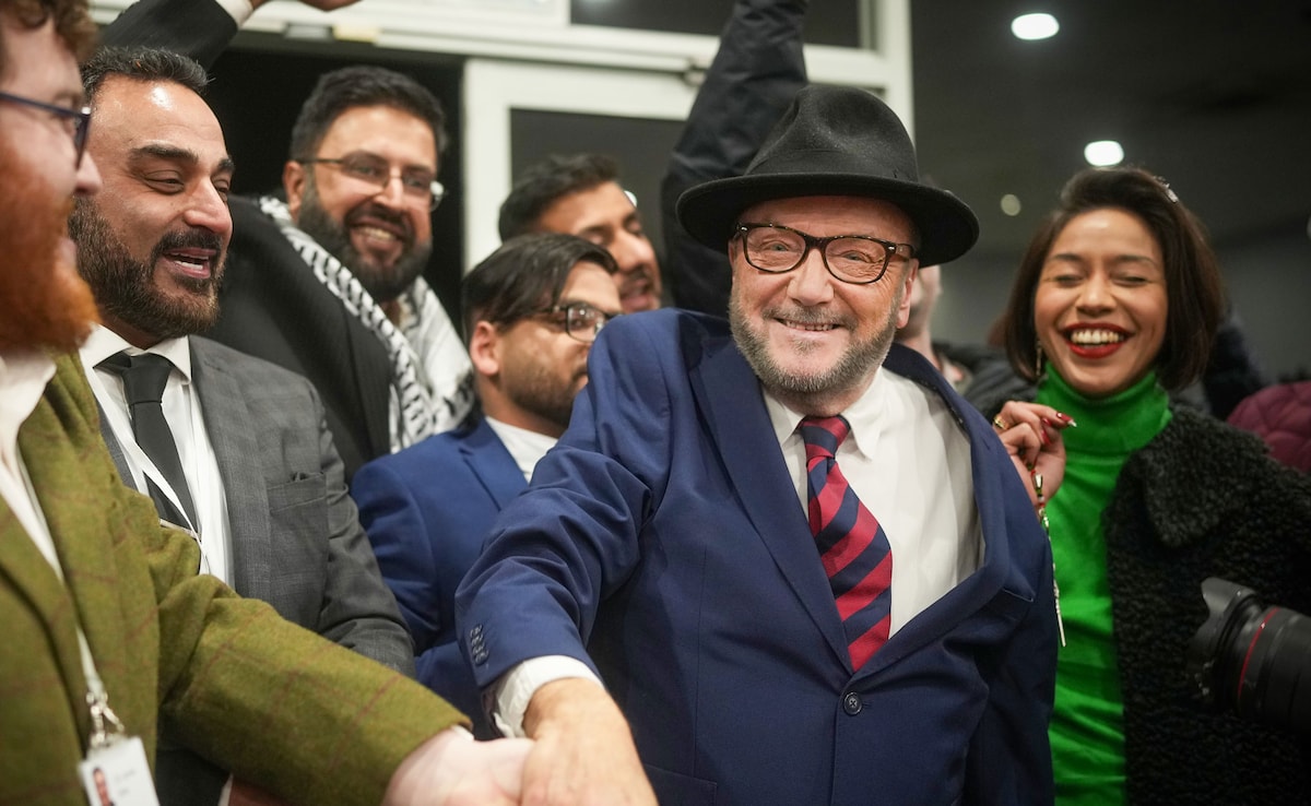 George Calloway celebrates after winning the Rochdale by-election on Feb. 29.