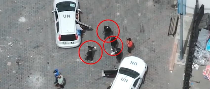 Израиль Опубликовал Видео, На Котором Запечатлены Вооруженные Люди Возле Автомобилей С Маркировкой ООН В Газе