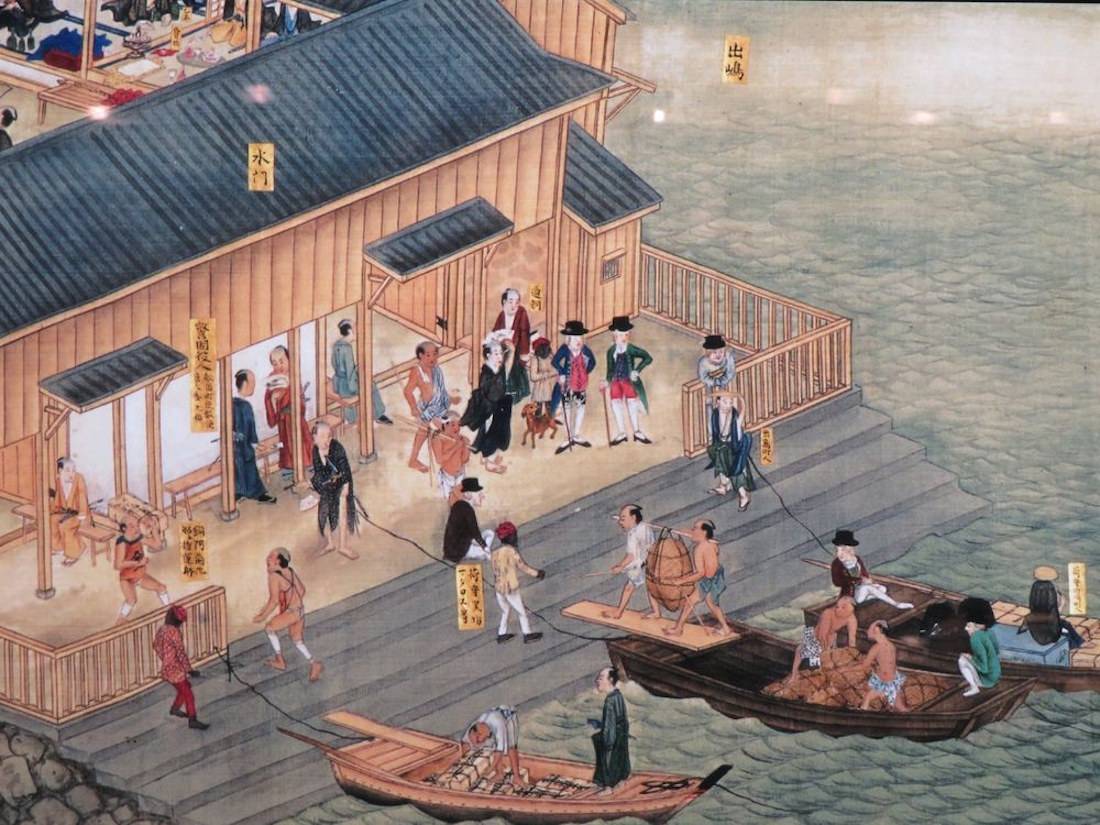 Comptoir commercial néerlandais de Dejima à Nagasaki au Japon, illustration historique montrant les échanges commerciaux entre marchands hollandais et japonais sur le quai portuaire