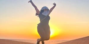 Sunrise Desert Safari with Quad Biking, Sand Boarding & Photo with Falcon
