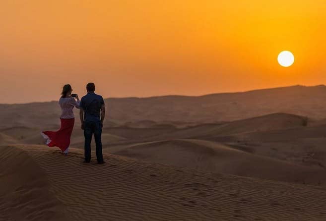 Morning – Catch the sun rising from the dunes At Desert Safari