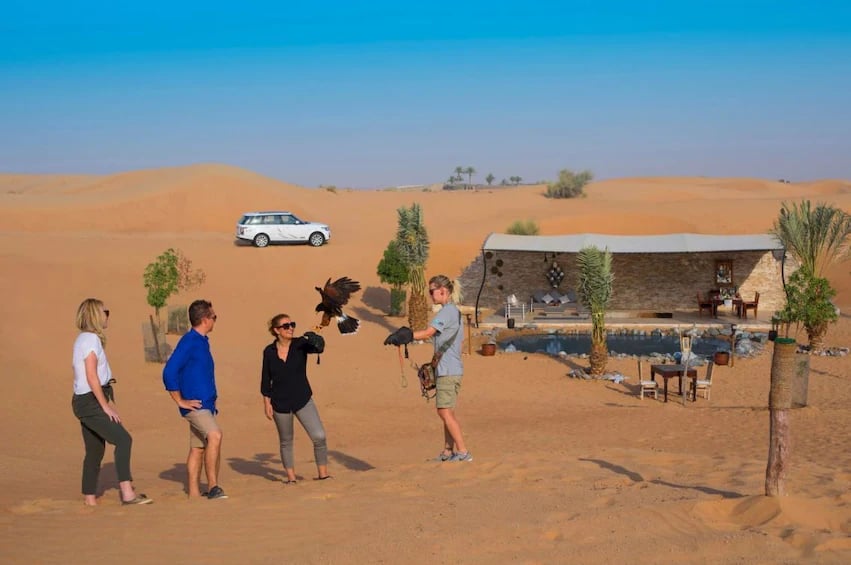 •	Morning Tour From Dubai On A 4WD & Quad Bike Safari That Includes Sandboarding, Dunking, And Riding