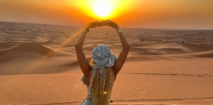 Sunrise Desert Safari with Quad Biking, Sand Boarding & Photo with Falcon