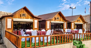 Desert Safari Dubai with AC Majlis Quad Biking Dedicated Butler Premium BBQ Dinner