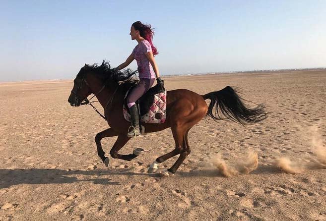 Riding A Horse