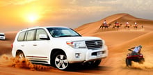 Sun Downer Desert Safari with Quad Biking Sand Boarding Premium BBQ Dinner