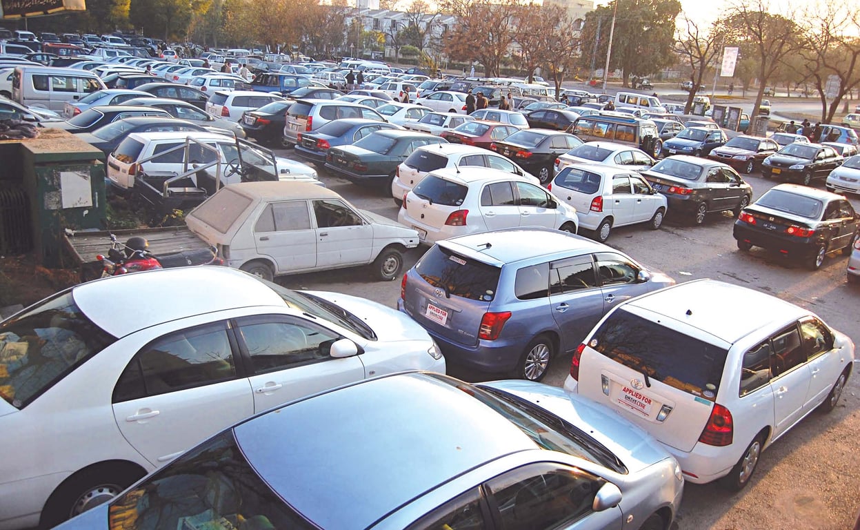 Vehicle And Parking Spaces In Al Jaheli