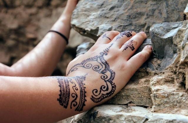 xi.	Temporary Henna tattoos