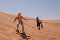Sandboarding on the Desert Dunes