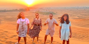 Sunrise Desert Safari with Quad Biking, Sand Boarding & Photo with Falcon