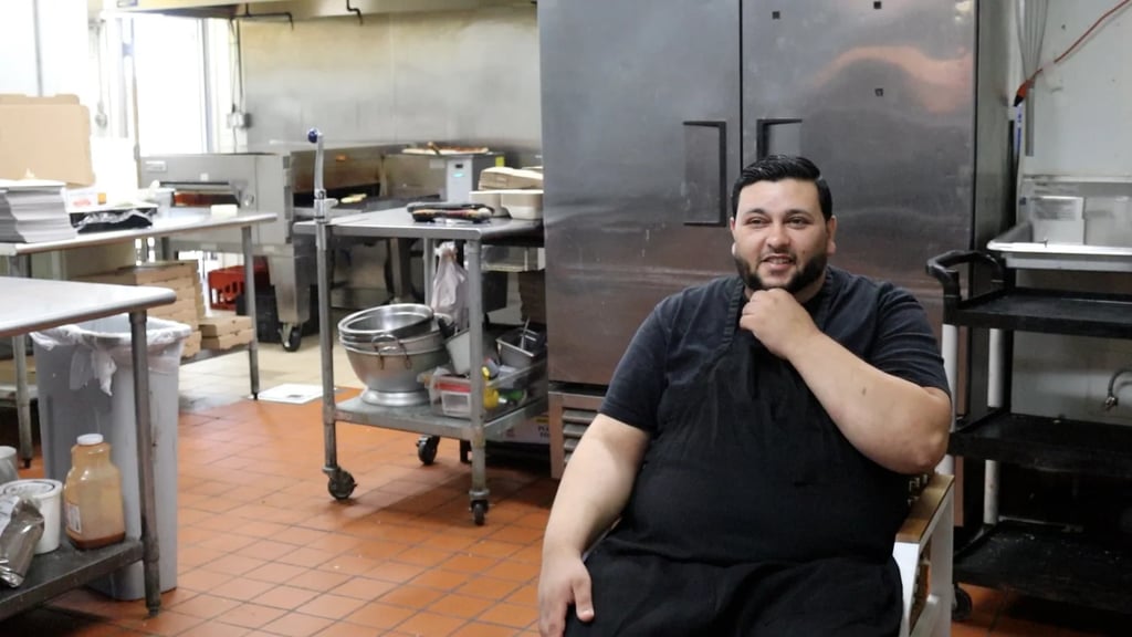Robert Jaber, owner of Rayo's Pizza, in his kitchen