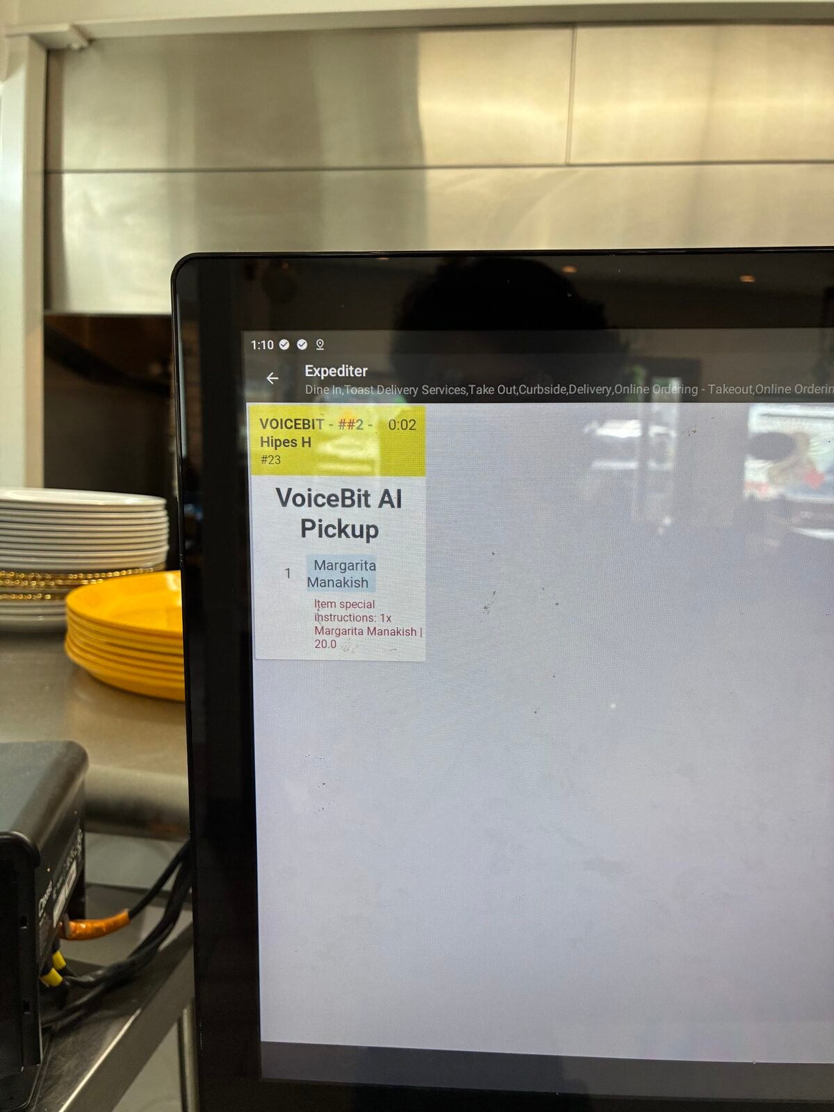 Close-up of a Toast Expediter screen showing a VoiceBit AI Pickup ticket with item special instructions