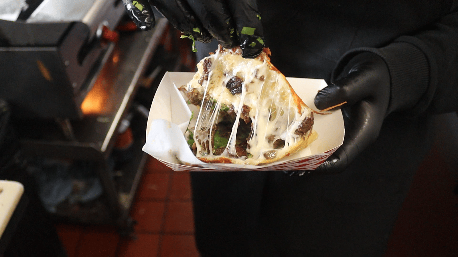 Cheesy steak quesadilla being prepared at Chando's Tacos in Sacramento