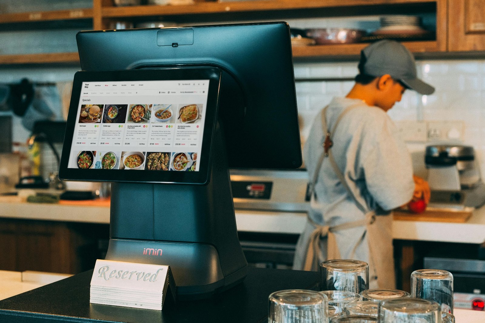 Modern POS terminal displaying a digital menu in a restaurant
