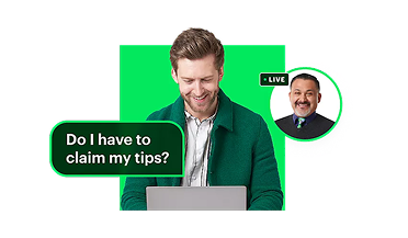 Man working on a laptop, filing a return online