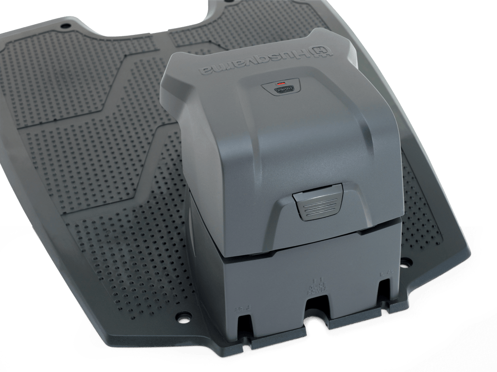 Stisknutím tlačítka PARK zavoláte sekačku zpět do nabíjecí stanice