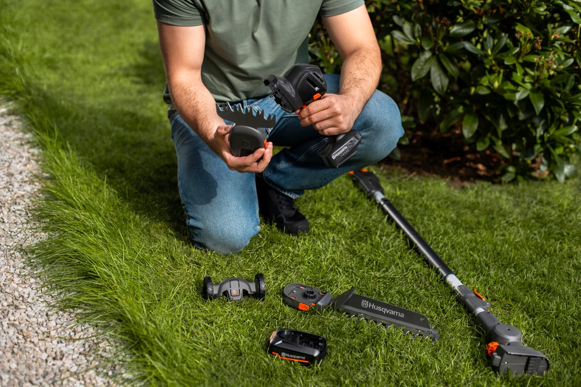 Switch between grass trimmer and hedge trimmer attachment without using tools.