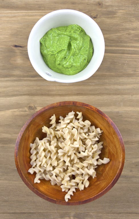 Picture of dry pasta (fusilli) and avocado spinach sauce