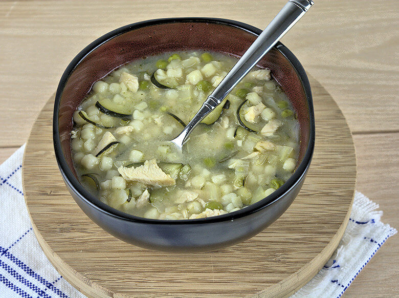 Picture of bowl with Italian Chicken Soup with Fennel & Zucchini with spoon
