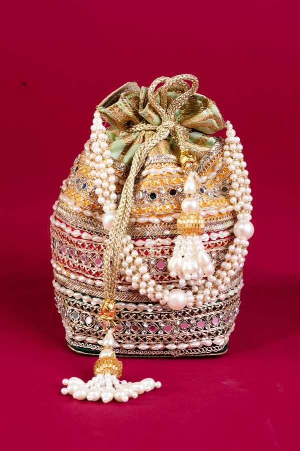 Shiffonz graceful banarsi pearl potli bag