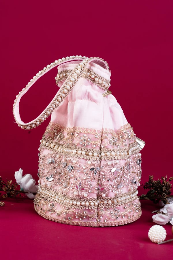 Shiffonz deluxe crepe pearl potli bag