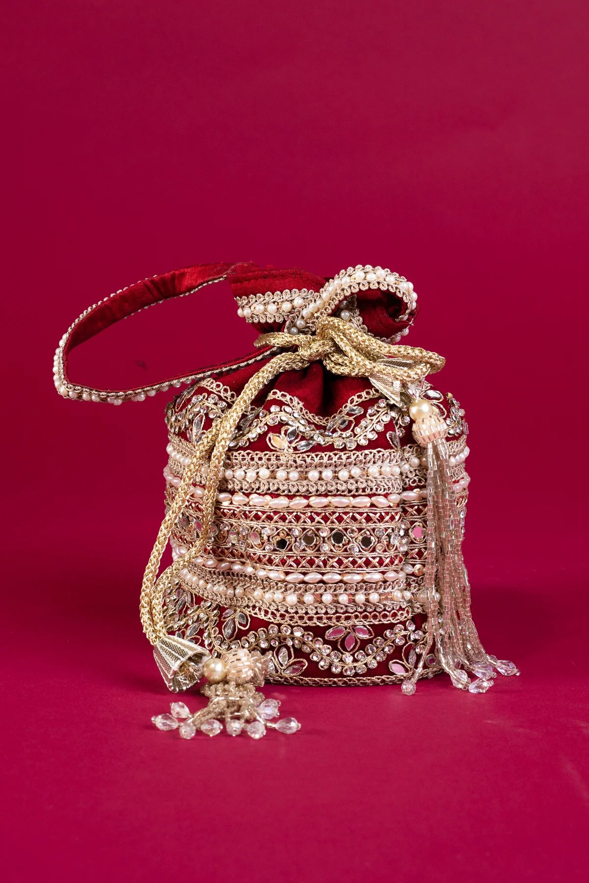 Shiffonz unique crepe pearl potli bag